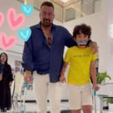 Sanjay Dutt and Shahraan walk arm in arm while Maanayata captures their cute video