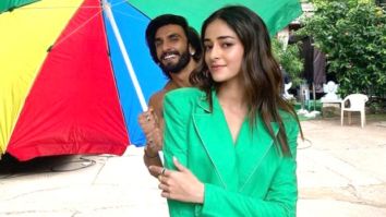 Ranveer Singh holds an umbrella for Ananya Panday as she poses in a stunning green blazer set