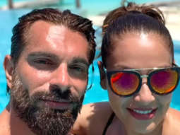 Bipasha Basu plants an adorable kiss on hubby Karan Singh Grover; watch video from their vacation