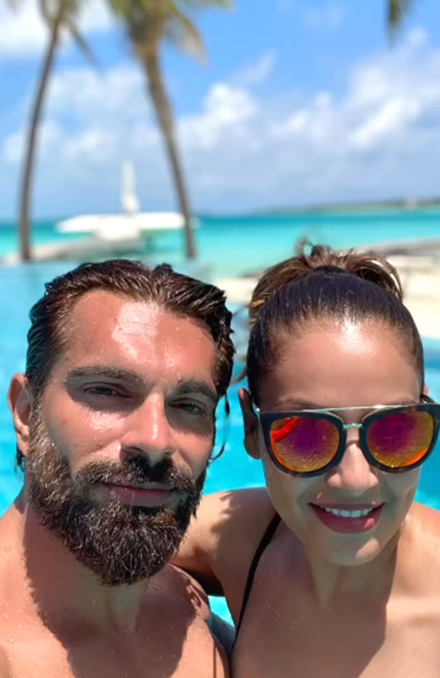 Bipasha Basu plants an adorable kiss on hubby Karan Singh Grover; watch video from their vacation Bipasha Basu plants an adorable kiss on hubby Karan Singh Grover; watch video from their vacation
