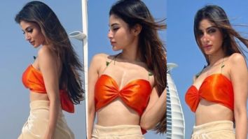 Mouni Roy pairs a neon orange bikini top with thigh-high slit skirt in Dubai