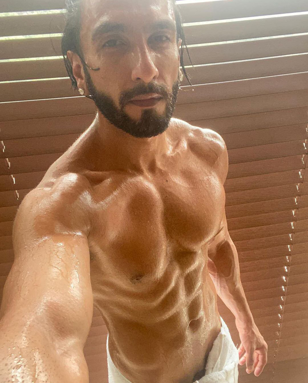 Ranveer gets cheeky flaunting his washboards abs ahead of his TV debut with The Big Picture