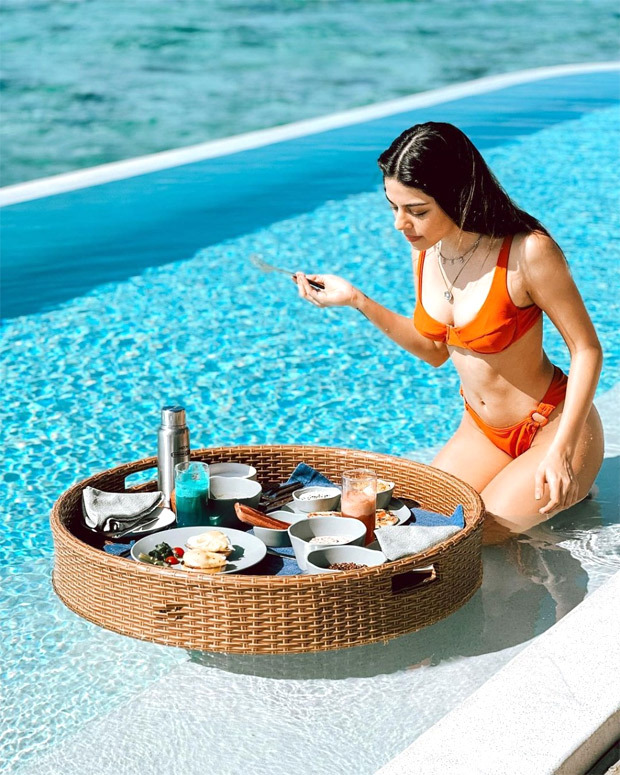 Alaya F enjoys floating breakfast in the pool in orange bikini in Maldives 