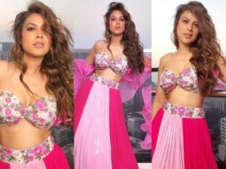 Nia Sharma stands out in an all-pink outfit; the metallic and shimmer elements add the perfect twist to her desi look