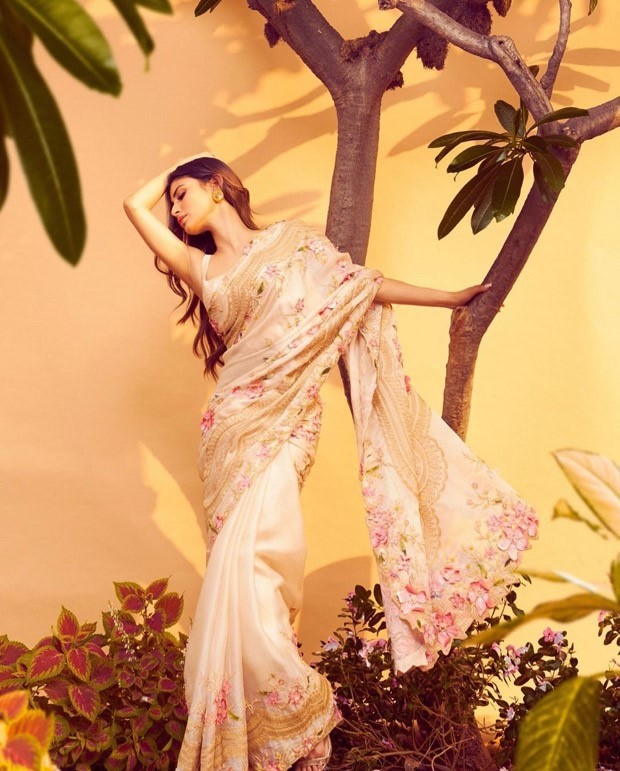 Mouni Roy enjoys in the festive season in a gorgeous beige floral saree