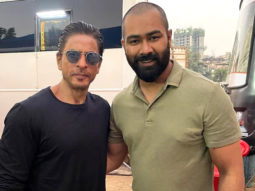 Shah Rukh Khan poses in a black T-shirt in latest picture from the sets of a film
