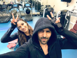 Shehzada stars Kartik Aaryan and Kriti Sanon pose in the gym as they workout together