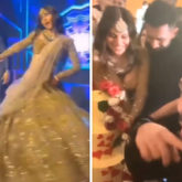 Mouni Roy and Suraj Nambiar groove to Rowdy Baby at their reception; couple kiss before they cut their wedding cake