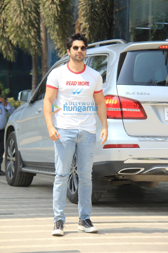 photos varun dhawan spotted in a white t shirt and blue denim pants at sajid nadiadwalas office in andheri 1
