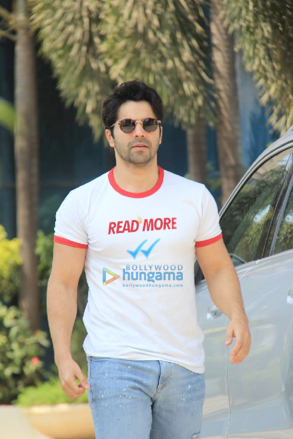 photos varun dhawan spotted in a white t shirt and blue denim pants at sajid nadiadwalas office in andheri 4