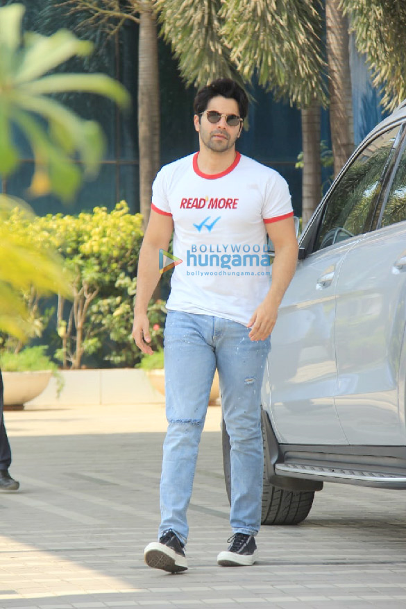 photos varun dhawan spotted in a white t shirt and blue denim pants at sajid nadiadwalas office in andheri 5