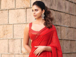 Suhana Khan is a vision in red as she stuns in a red Manish Malhotra saree; mother Gauri Khan reacts