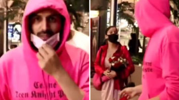 Kartik Aaryan gets chased by female fans holding roses at the airport; paparazzo asks the girls to go on one knee and propose