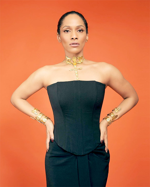 Masaba Gupta adds a dramatic twist to her all-black corset and skirt ensemble by accessorising it with gold jewellery