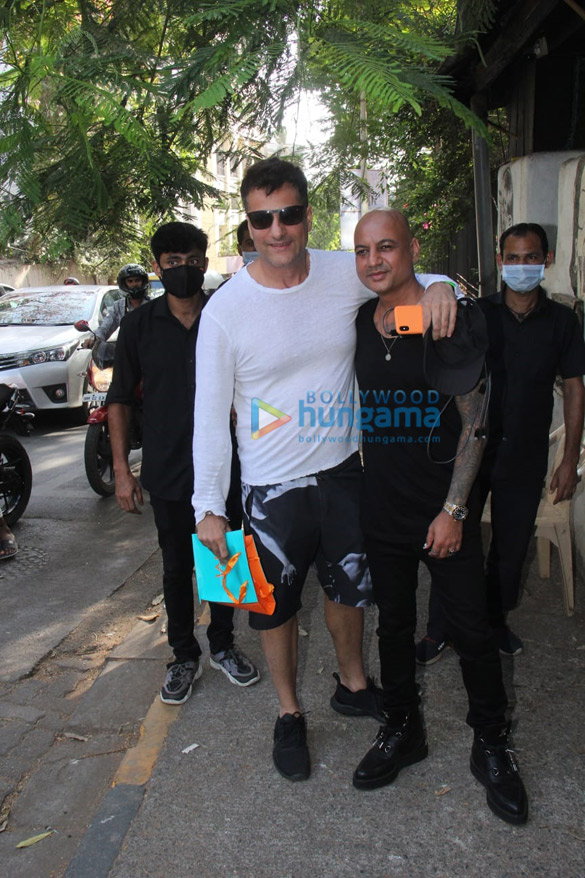Photos: Fardeen Khan snapped with Hakim Aalim outside the latter’s salon in Bandra Photos: Fardeen Khan snapped with Hakim Aalim outside the latter’s salon in Bandra