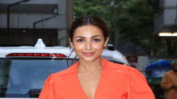 Photos: Malaika Arora glows in an orange outfit as she gets spotted in Bandra