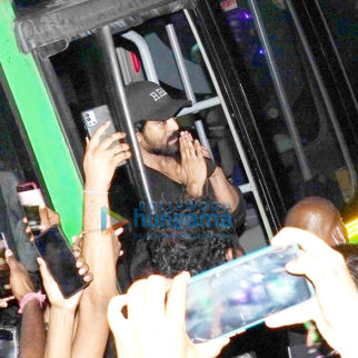 Photos: Ram Charan greets fans as he arrives to watch the early morning show of RRR in Hyderabad