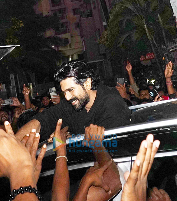 photos ram charan greets fans as he arrives to watch the early morning show of rrr in hyderabad 3