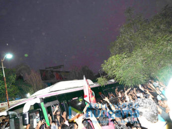Photos: Ram Charan greets fans as he arrives to watch the early morning show of RRR in Hyderabad