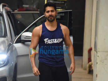 Photos: Varun Dhawan poses for the paparazzi as he hits a gym in Khar