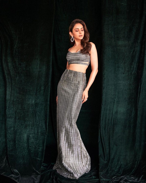 Rakul Preet Singh glistens in platinum crop top and column skirt for Attack promotions