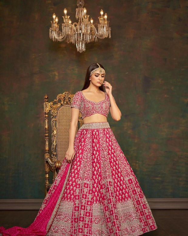 Take notes from Mrunal Thakur who captivates as modern bride in fuchsia pink zari and zardosi work embellished wedding lehenga