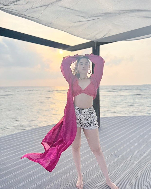 Tamannaah Bhatia exudes 'hot girl summer' vibes in pink bikini top, printed shorts and drape shrug in Maldives