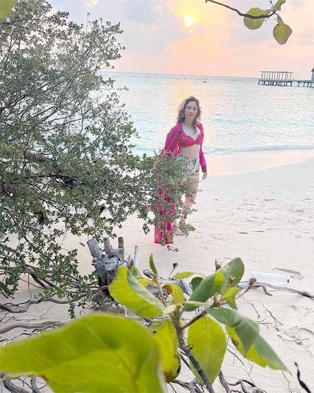 Tamannaah Bhatia exudes 'hot girl summer' vibes in pink bikini top, printed shorts and drape shrug in Maldives