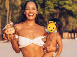 Lisa Haydon poses in a white bikini as she shares glimpses from her day out at the beach with her daughter