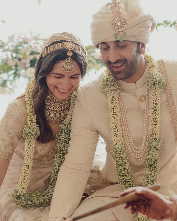 Ranbir Kapoor-Alia Bhatt Wedding: Bride wore hand dyed ivory organza embroidered saree; groom donned embroidered silk sherwani with uncut diamonds by Sabysachi Mukherjee 