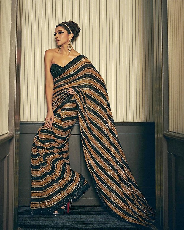 Cannes 2022: Deepika Padukone enchants in Sabyasachi sequin saree inspired by majestic Bengal Tiger on the red carpet as jury member  Cannes 2022: Deepika Padukone enchants in Sabyasachi sequin saree inspired by majestic Bengal Tiger on the red carpet as jury member