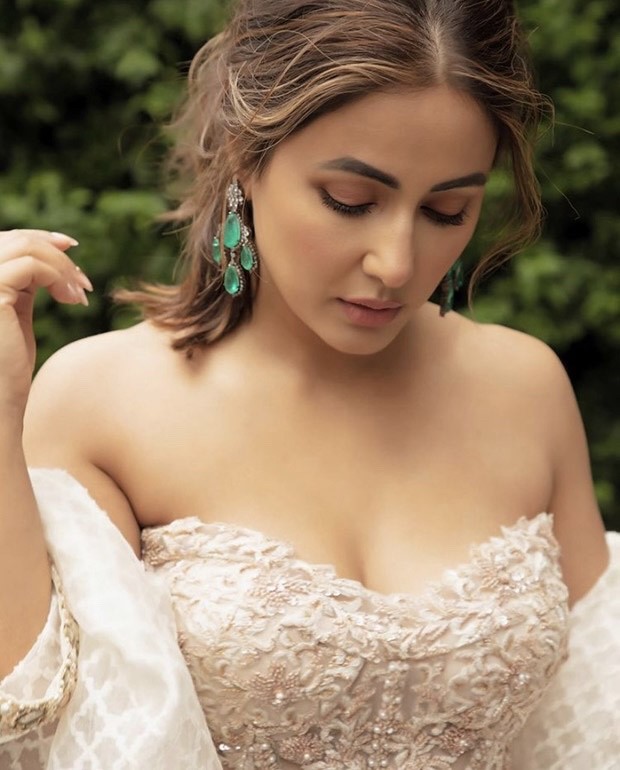 Hina Khan sets hearts racing in white sheer off-shoulder corset paired with draped skirt and embellished jacket worth Rs.1.5 lakh for the UK Asian Film Festival
