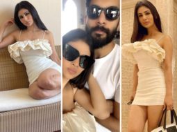 Mouni Roy looks smoking hot in white mini dress as she twins with her husband Suraj Nambiar in Doha