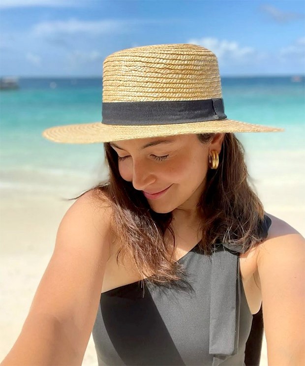 Anushka Sharma makes summer days hotter in chic black one-shoulder swimsuit and a straw hat Anushka Sharma makes summer days hotter in chic black one-shoulder swimsuit and a straw hat