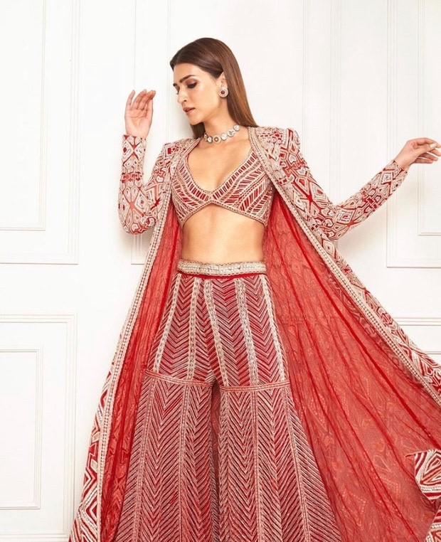 Kriti Sanon is giving us millennial bridesmaid goals in gorgeous red sharara set worth ₹ 2.58 Lakh
