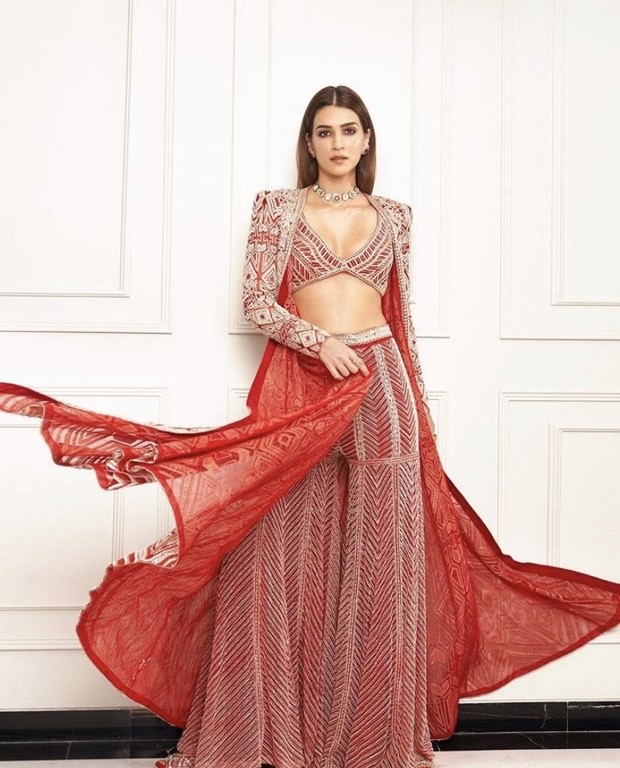 Kriti Sanon is giving us millennial bridesmaid goals in gorgeous red sharara set worth ₹ 2.58 Lakh