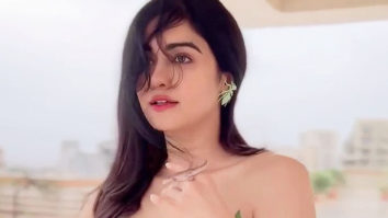 Adah Sharma poses with a lizard wearing a leafy dress