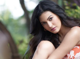 Amyra Dastur flaunts her glossy dress