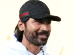 Dhanush spotted at airport, smiles at paps