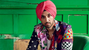Diljit Dosanjh riding on with pink-blue combination