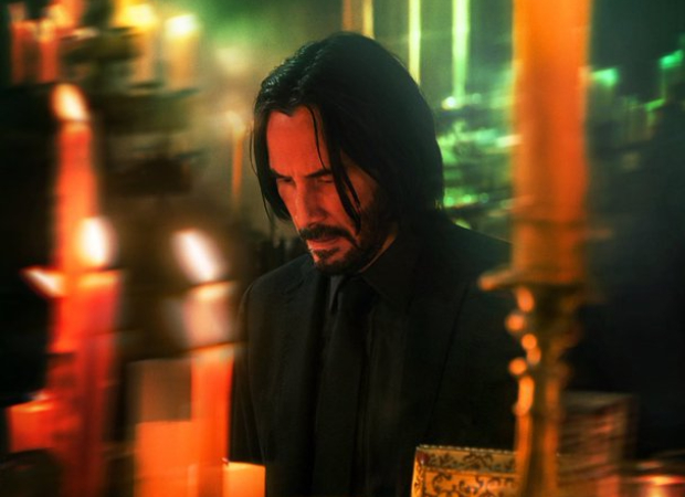 John Wick: Chapter 4 first photo sees Keanu Reeves praying while surrounded by church candlelights