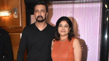 Kichcha Sudeepa poses with his wife for paps