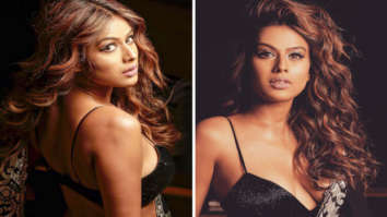 Nia Sharma in deep-neck black transparent saree and strappy blouse has us swooning