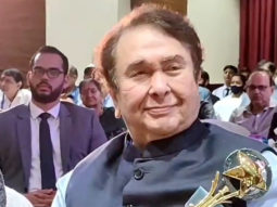 Randhir Kapoor smiles as he poses with his award