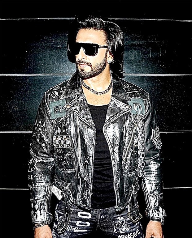 Ranveer Singh is nailing the edgy biker boy look in a funky black and silver jacket, pants and boots at Liger trailer launch 