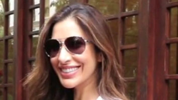 Sophie Choudry poses for paps with her dog