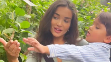 Amy Jackson and her son play with a butterfly