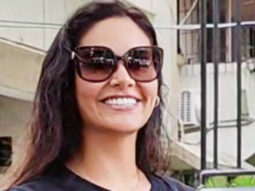 Esha Gupta greets paps with a smile