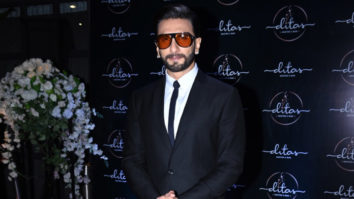 Ever energetic Ranveer Singh poses in a black suit
