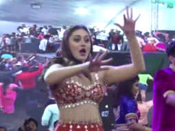 Shefali Jariwala performs on stage for a large crowd